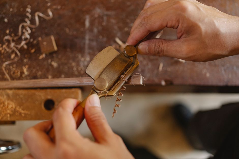 Artisan woodworker crafting handmade furniture in a professional workshop