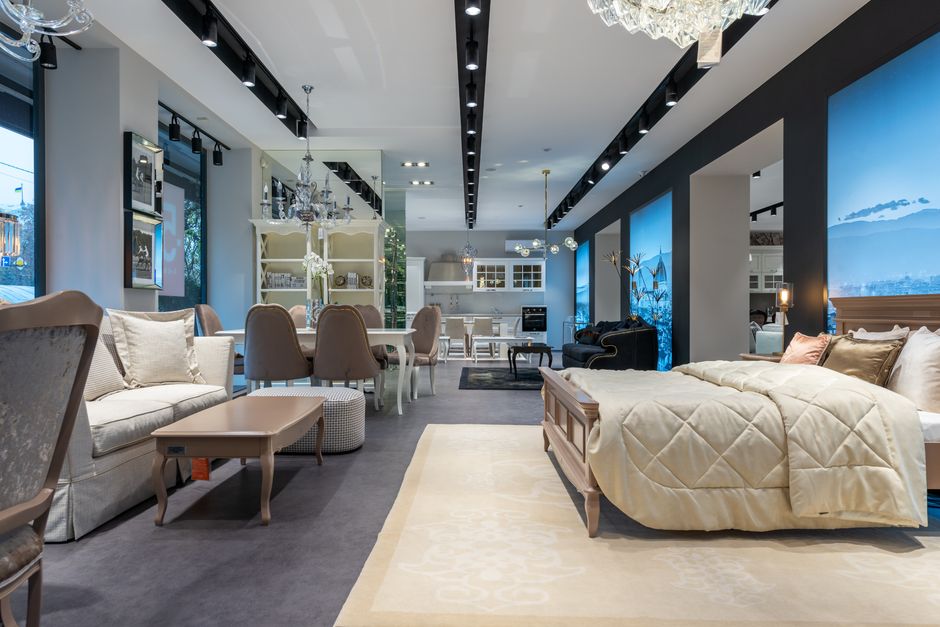 Modern luxury custom furniture showroom showcasing elegant seating and tables